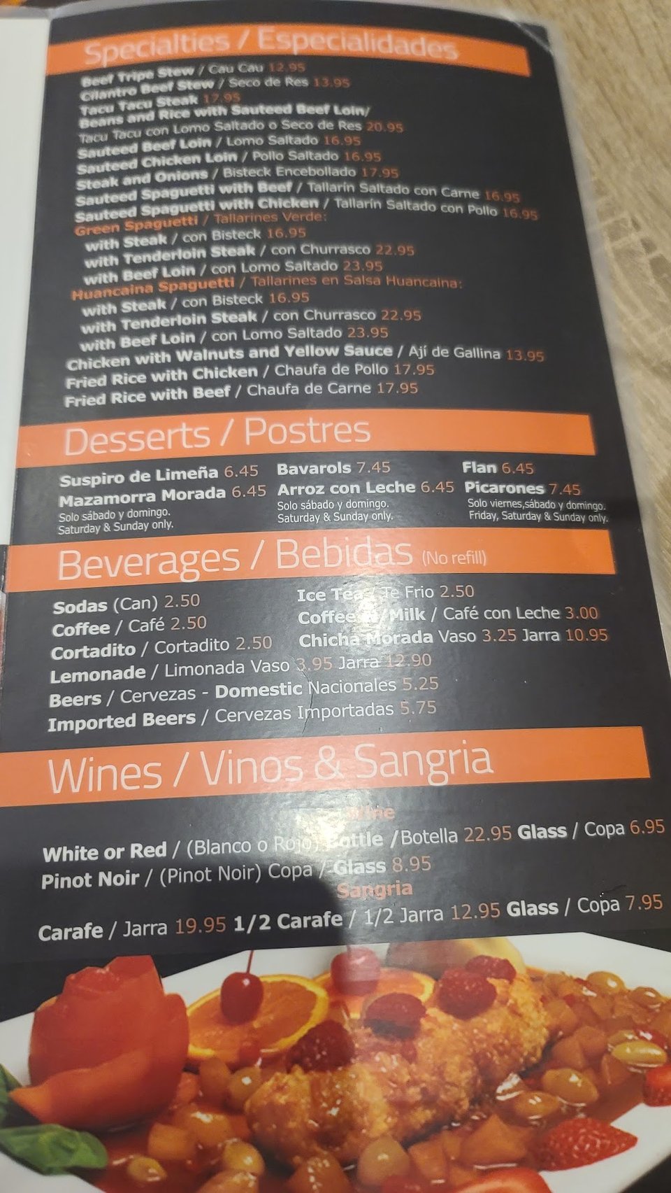 Printed menu with Peruvian appetizers and seafood selections.